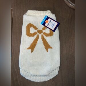 Cream dog sweater with gold bow
